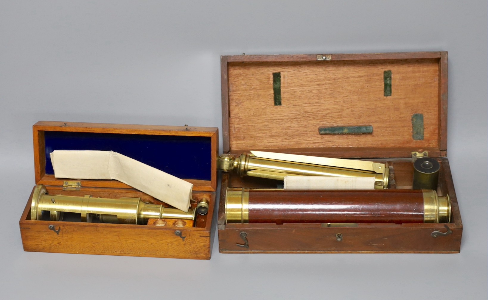 A Victorian Gilbert & Son portable achromatic telescope, boxed and a compound microscope